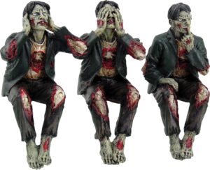 Figurine The Walking Dead Nemesis Now, trio de zombies sages en résine 10 cm